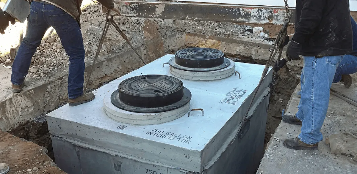 Grease trap installation for a commercial property drainage system in Lincoln, NE