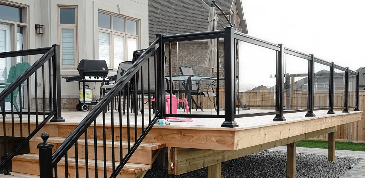 Handrail installation on a deck staircase for safety and code compliance in Lincoln, NE